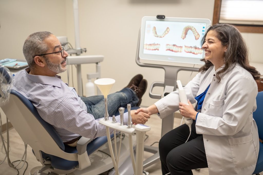 Dr. Sally Awad with patient